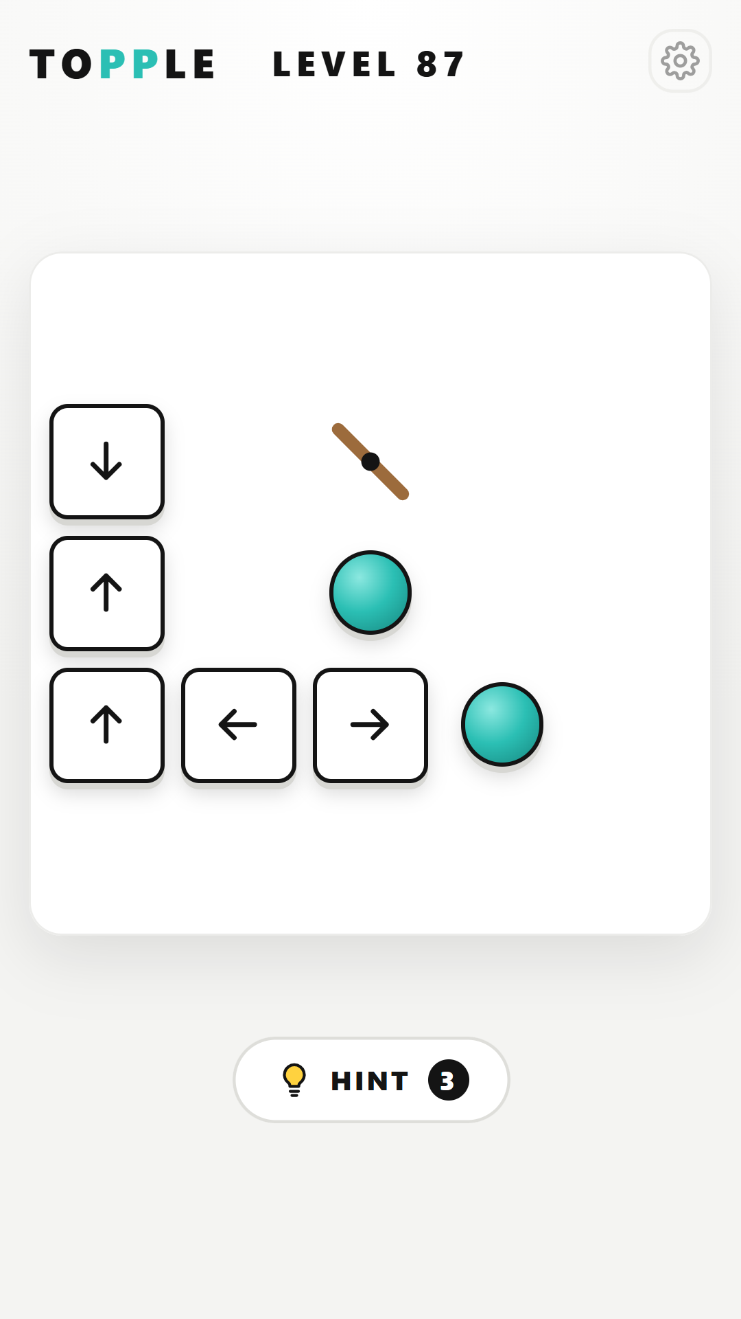 A Topple level with arrow tiles, teal marbles and a wooden deflector